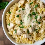 creamy garlic butter chicken and rotini in parmesan sauce