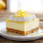 No bake lemon bar cheesecake with whipped topping and lemon zest
